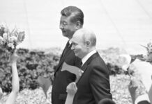 Vladimir Putin visita China